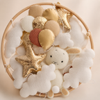 Matières et couleurs bohèmes du mobile bébé lapin
