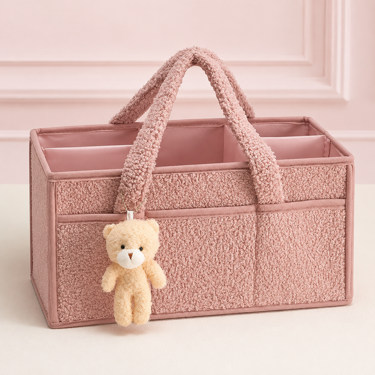 Organiseur à langer en tissu bouclette rose poudré